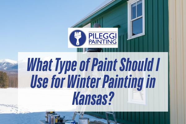 Man painting a exterior house during winter