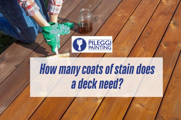 a woman wearing gloves staining a deck with a caption How many coats of stain does a deck need